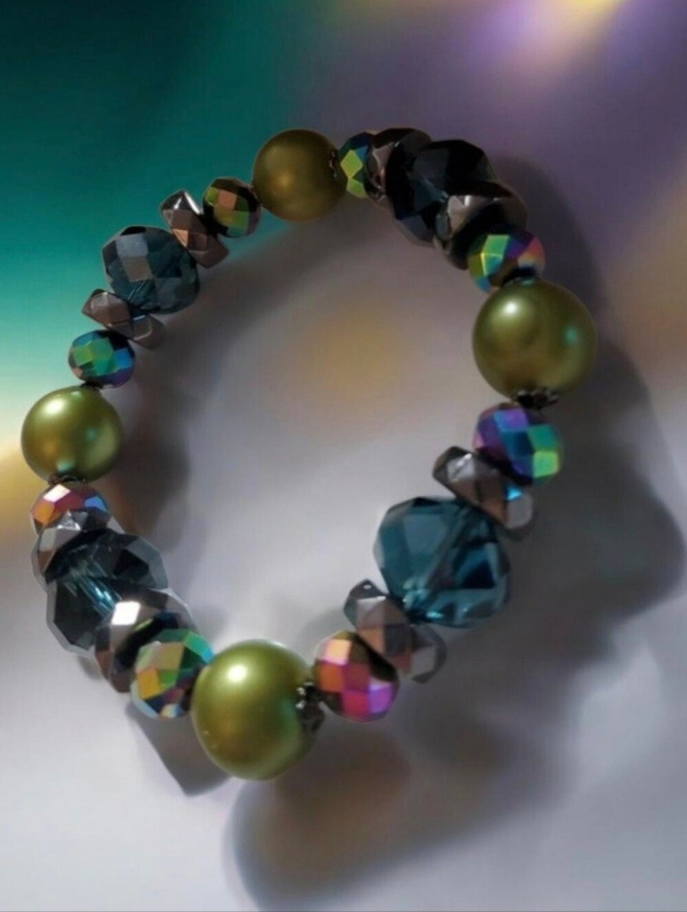 Green & Purple Beaded Stretch Bracelet with multi color faceted beads